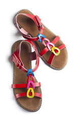 Top view on pair of colorful female sandals