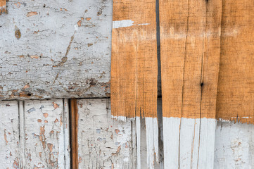 Old dirty wooden wall, natural and painted in white.