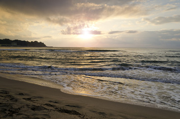 Fototapeta na wymiar Radiant sea beach sunrise in Kiten, Bulgaria