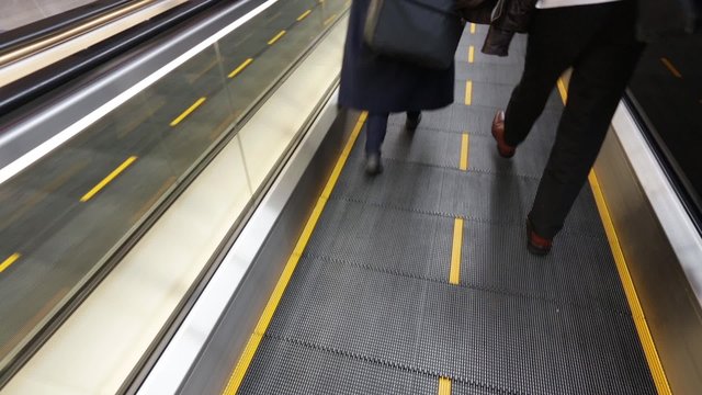 Airport moving sidewalk also travelator, walkalator and movator.