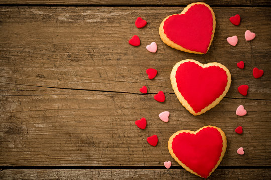 Cookies hearts on old wood background