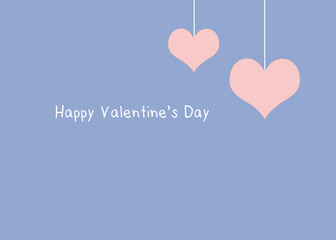 Two hanging pink heart shape on blue background, valentine's day concept