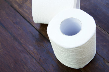 Tissue paper with a wooden floor in the background.