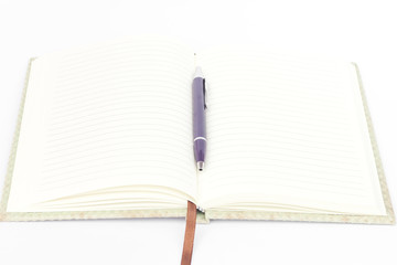 Naklejka premium Notebook with pen isolated on white background