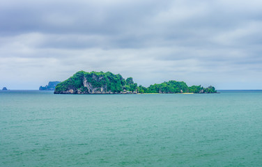 Seascape view of Ko Maphrao island in gulf of Thailand. The scenery was taken from Hat Sai Ri beach at Chumphon province.
