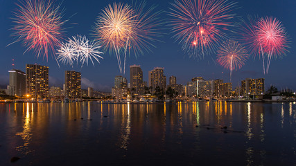 Colorful firework over Honolulu skyline Hawaii