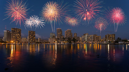 Colorful firework over Honolulu skyline Hawaii