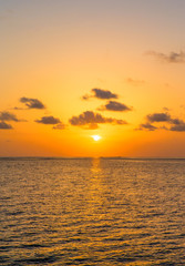 Obraz premium Sunset on sea in Maldives