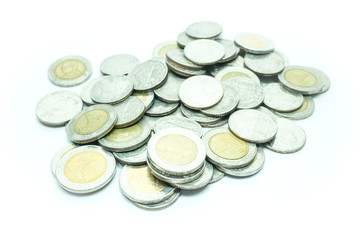 Group of Thai baht coins on white table background
