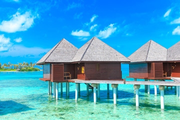  beach with water bungalows Maldives