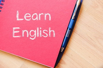 Learn english write on notebook