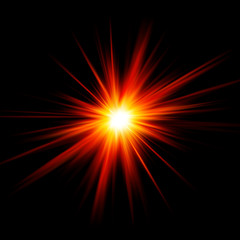 Esplosione di luce rossa e gialla su sfondo nero