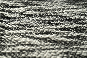 Black and white texture of a knitted textile
