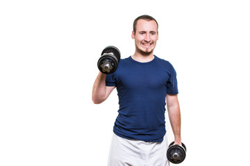 Close up of young man lifting weights over white background