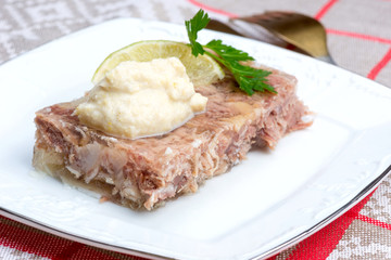 Russian aspic - kholodets with chopped horseradish (chren)