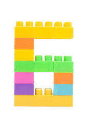 colorful plastic blocks forming the number six