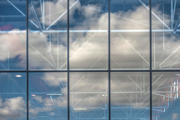 windows, clouds and sky reflections