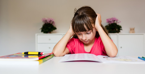 Frustrated girl with homework