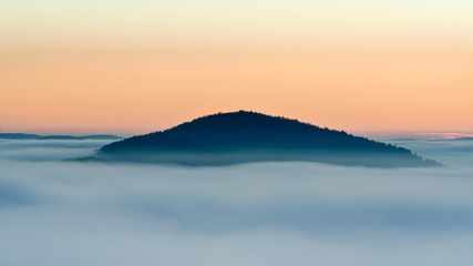 The Floating Mount , silhouette of the mountains in the clouds