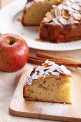 Fresh baked apple cake on table.