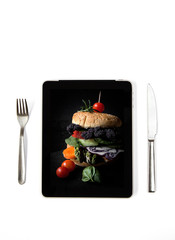 Photo vegan burger on tablet indoors