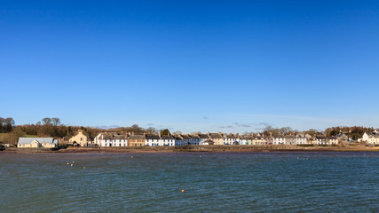 Garlieston Waterfront.  The view across Garlieston Bay to the small coastal village of Garlieston in Dumfries and Galloway, Southern Scotland.