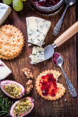 Chese served on crackers with cranbery