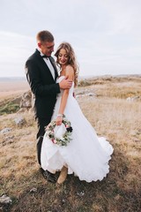 beautiful wedding couple in the mountains