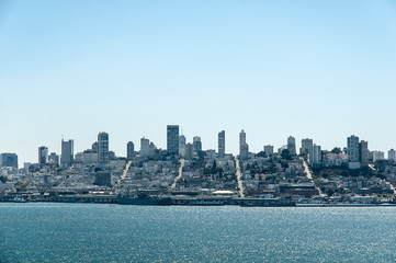 Fototapeta premium View of San Francisco buildings and street grid as seen from Alcatraz Island.