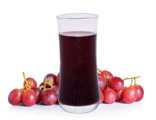 Glass of grape juice isolated on white