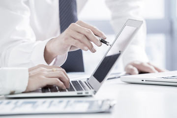 Business people discussing the charts and graphs showing the res