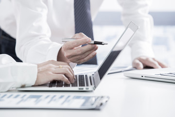 Business people discussing the charts and graphs showing the res