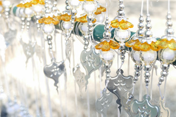 bead decorating on silver Bodhi leaf in buddhist temple