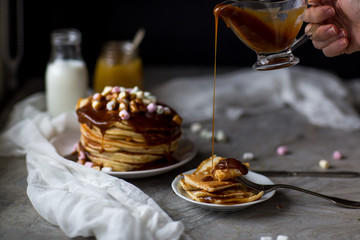 Pancake with caramel, marshmallow and honey