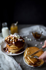 Pancake with caramel, marshmallow and honey