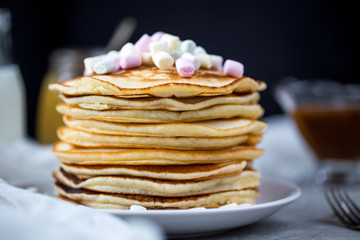 Pancake with caramel, marshmallow and honey