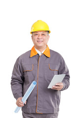 isolated engineer in hardhat with blueprint and tablet