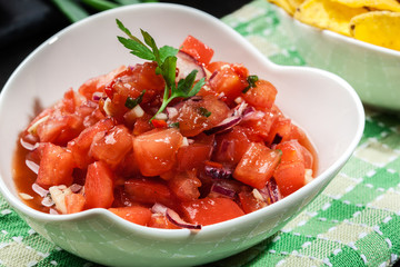 Bowl of fresh salsa with tortilla chips