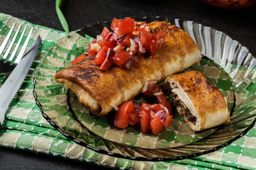 Mexican chimichanga with salasa dip