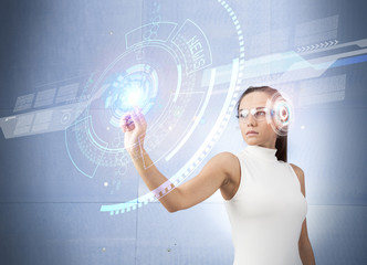 Woman touching the virtual future interface