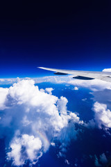 view of the wing of an airplane through the window