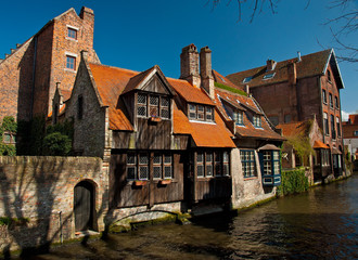 Fototapeta na wymiar Houses along the canals of Brugge or Bruges, Belgium