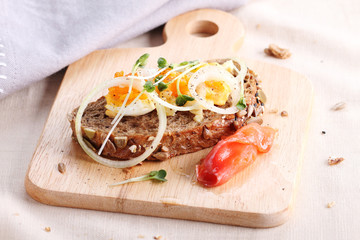 smashed egg and pickled onion on cereal rye bread