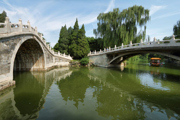 Fototapeta na wymiar Arch bridge in Summer Palace