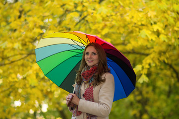Woman with rainbow umbrella