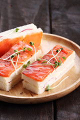 smoked salmon and radish finger sandwiches.