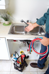 Plumber on the kitchen.