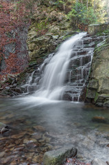 Fototapeta na wymiar Waterfall Wielki in Obidza, Beskid Sadecki mountain range in Polish Carpathian Mountains