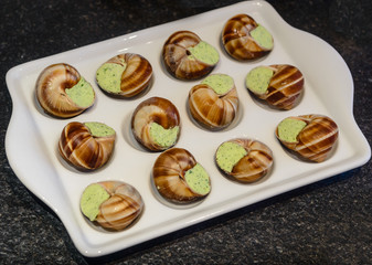 Some snails on a plate