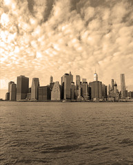 Obraz premium Vertical Panorama of Manhattan skyline, New York City, sepia toning